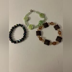Lot of 3 bracelets, two stretch and one clasp